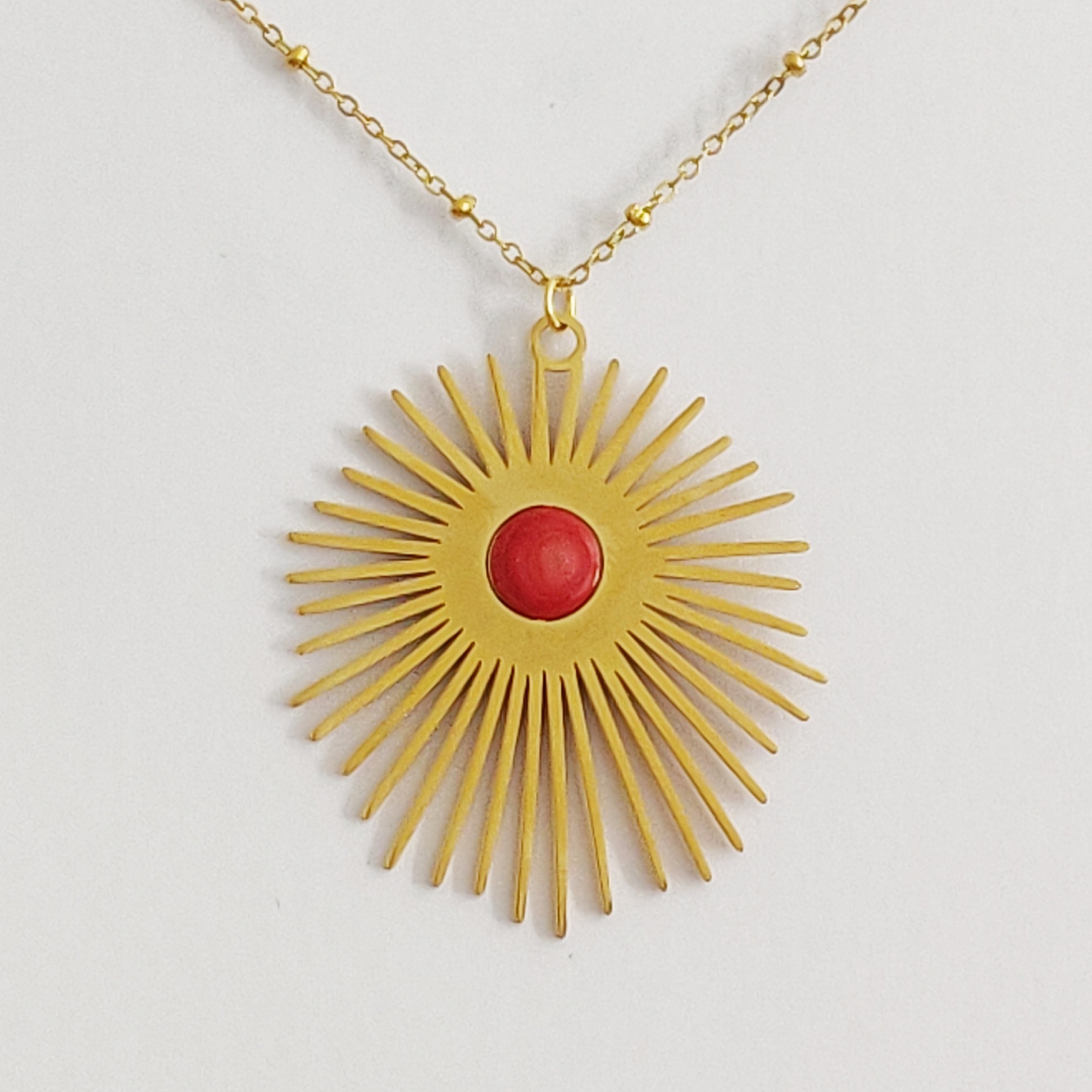 bijou créateur montpellier pendentif hélios corail